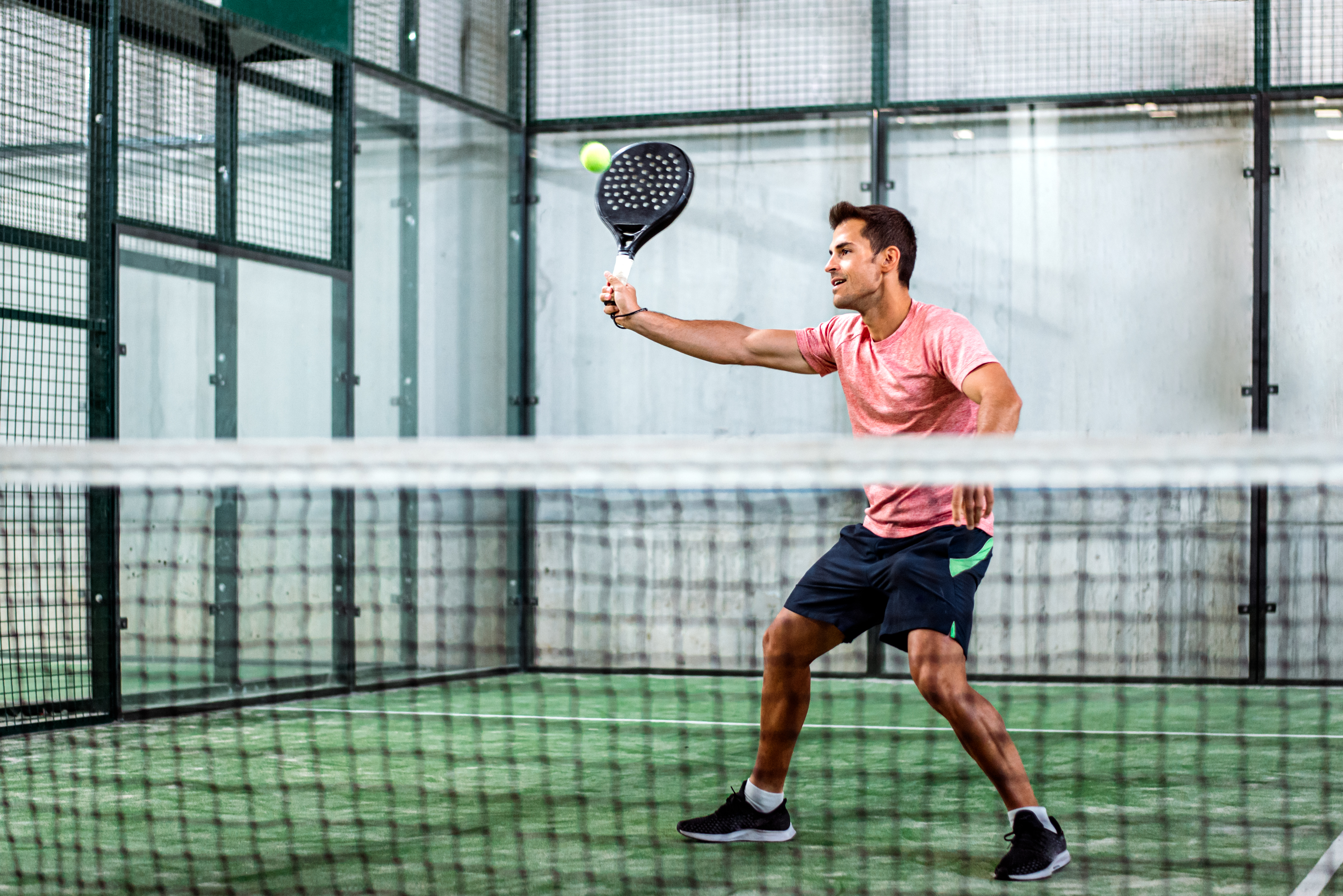 Players competing in a padel match